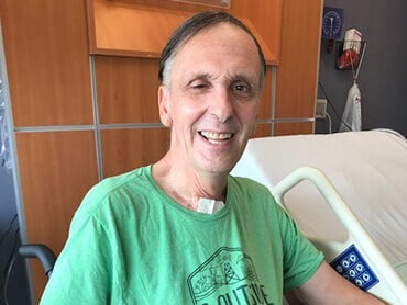 Patient Louis Eddie Jones, smiling.